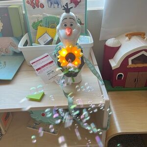 Disney Olaf Toy with Glowing Orange Flower